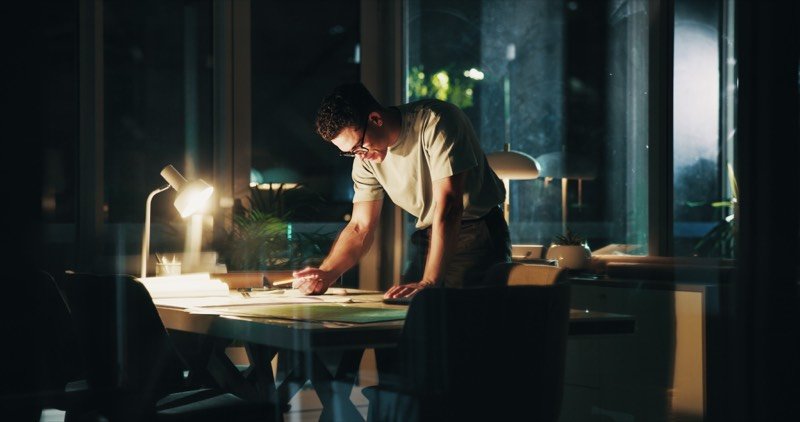 Business owner working late at night